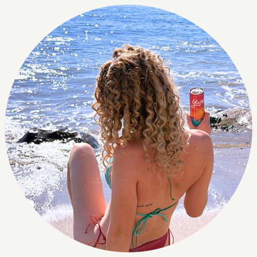 yume-island-bliss-sparkling-drink-woman-sunlight